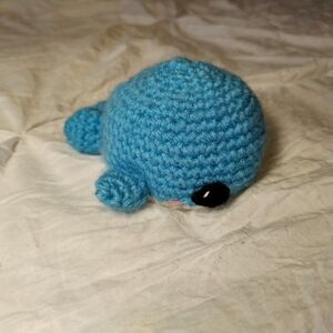 Crochet blue whale with soft eyes